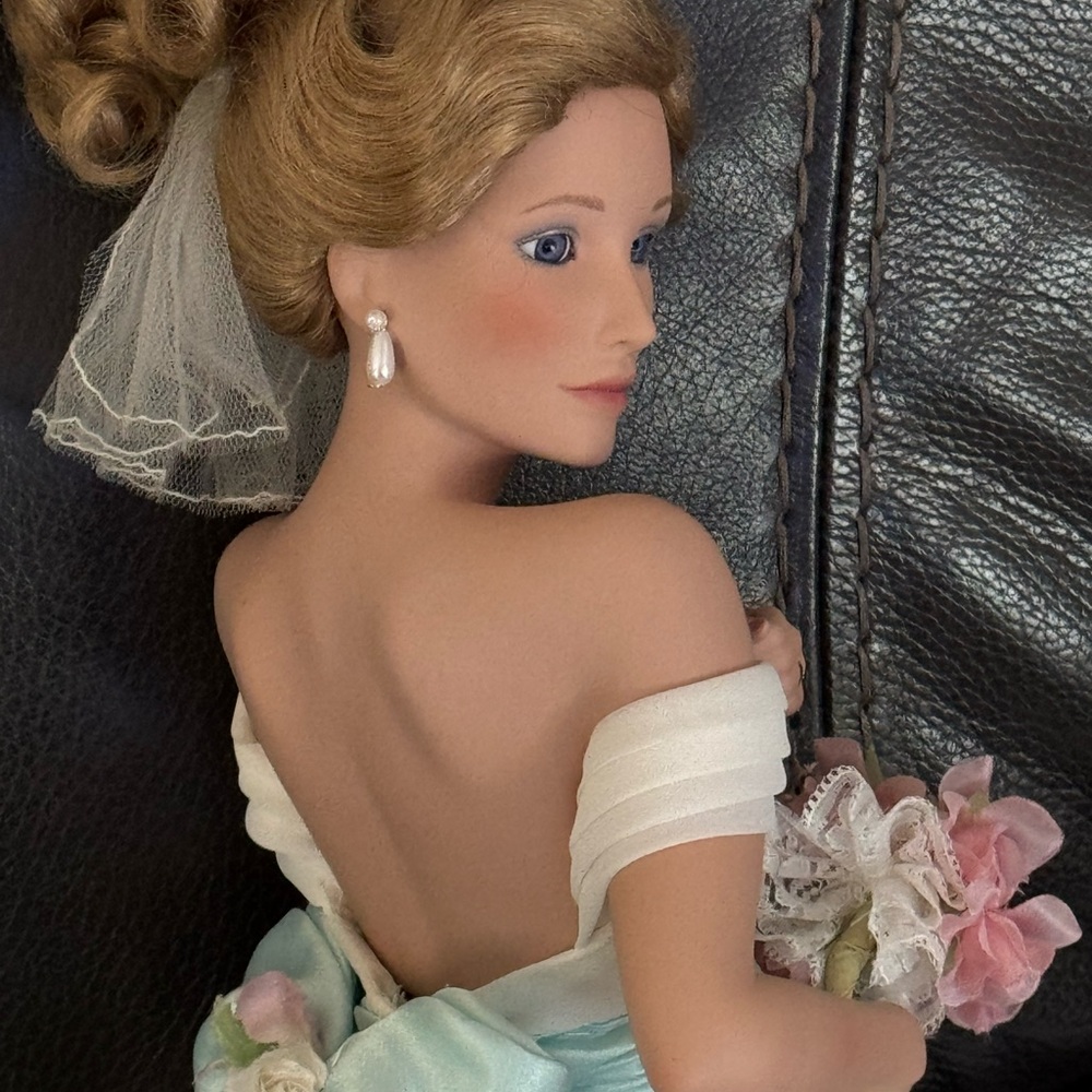 Elegant Porcelain Doll